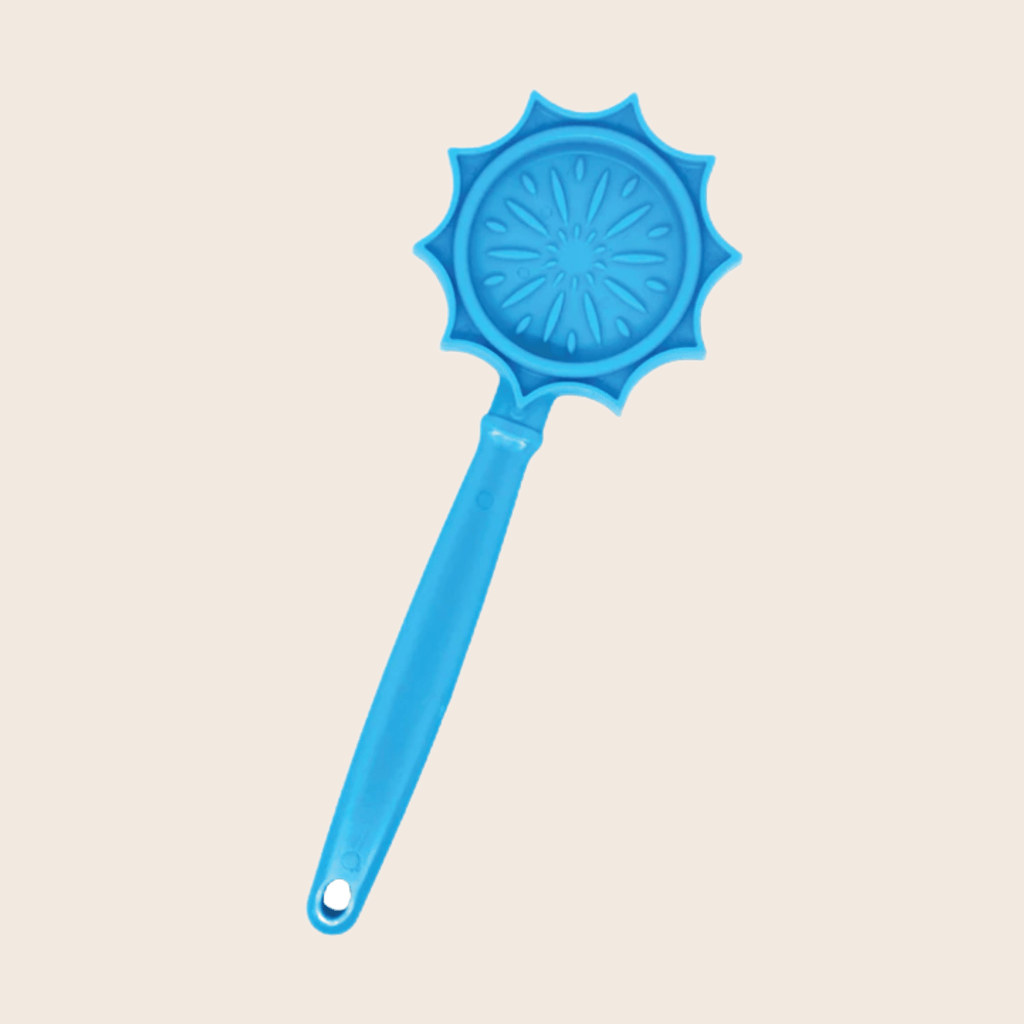 Close-up of the Blue Flower lick stick by SodaPup, a light blue flower design for spreads