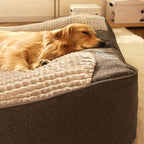 Plush indoor dog bed with bolstered, cushioned sides