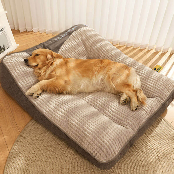 Cushioned rectangular dog bed with a soft, calming surface