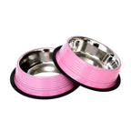 High-gloss, powder-coated Carnation Pink exterior on a Country Living ribbed steel bowl