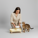 Double bowl feeding station with an anti-spill rim on each bowl for eager drinkers
