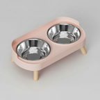 Cherry blossom pink elevated double bowl feeder with two stainless steel bowls on a raised ABS base for food and water