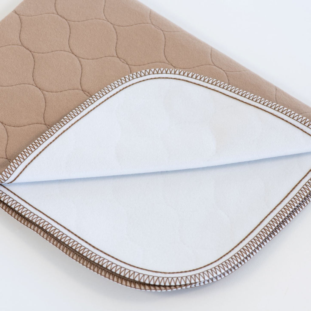 EZwhelp brown laminated whelping pad with rounded corners that lie well against box walls