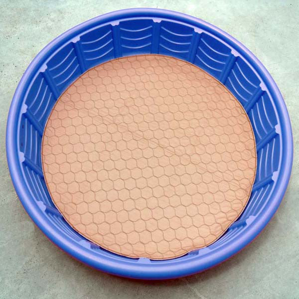 EZwhelp brown laminated round pad, 36 inches in diameter, with a white waterproof tricot bottom