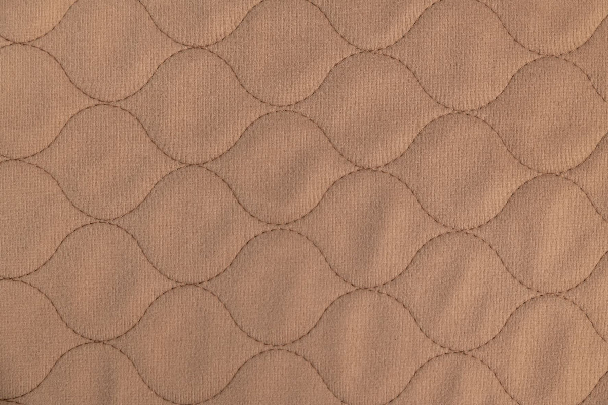 Close-up of the coffee-colored, stain-resistant brushed polyester top on an EZwhelp brown pad