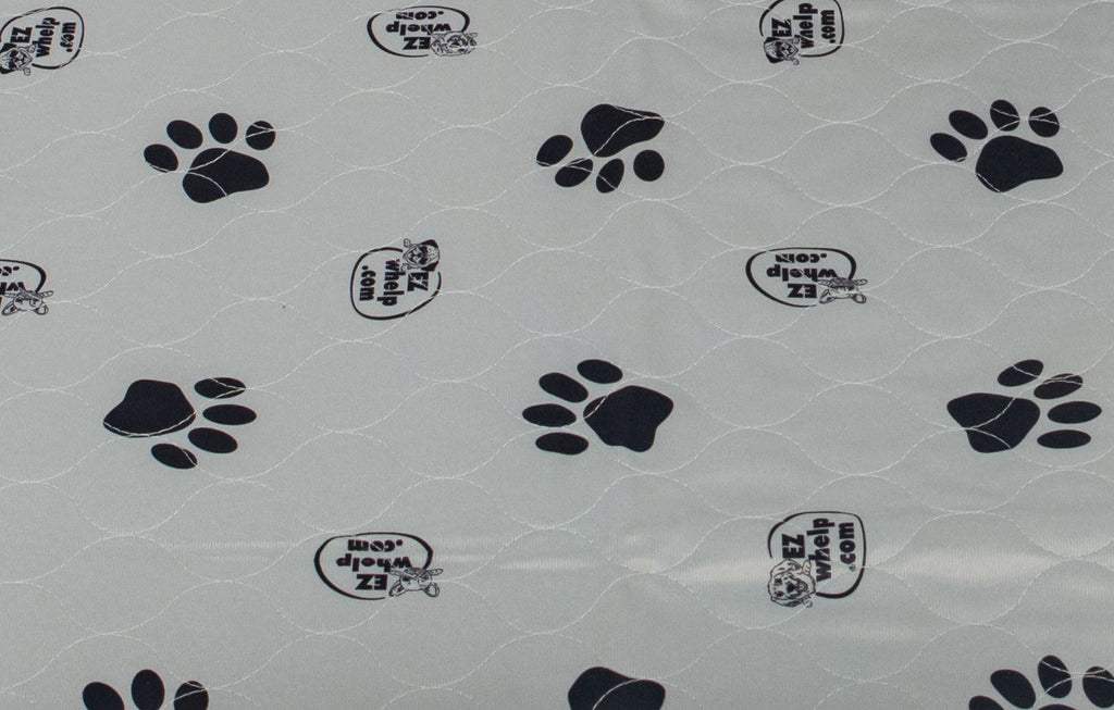 EZwhelp gray paw print whelping pad with a soft, velvet-touch brushed polyester top