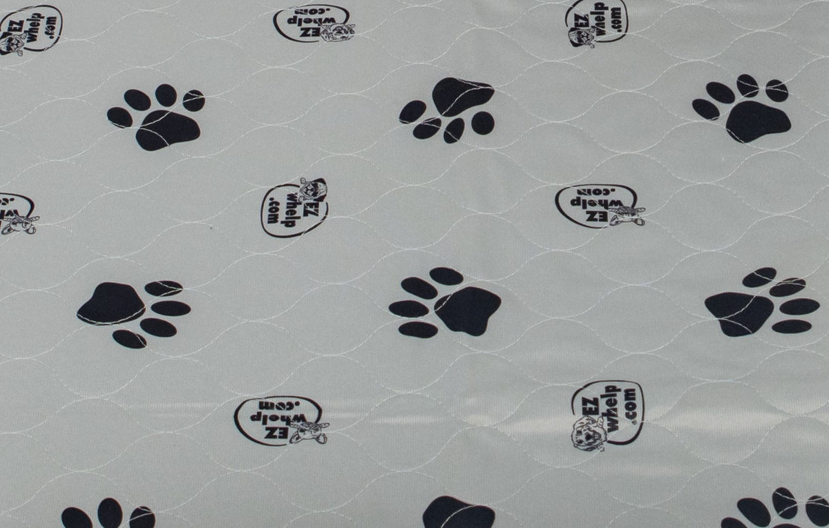 EZwhelp gray paw print whelping pad with a soft, velvet-touch brushed polyester top