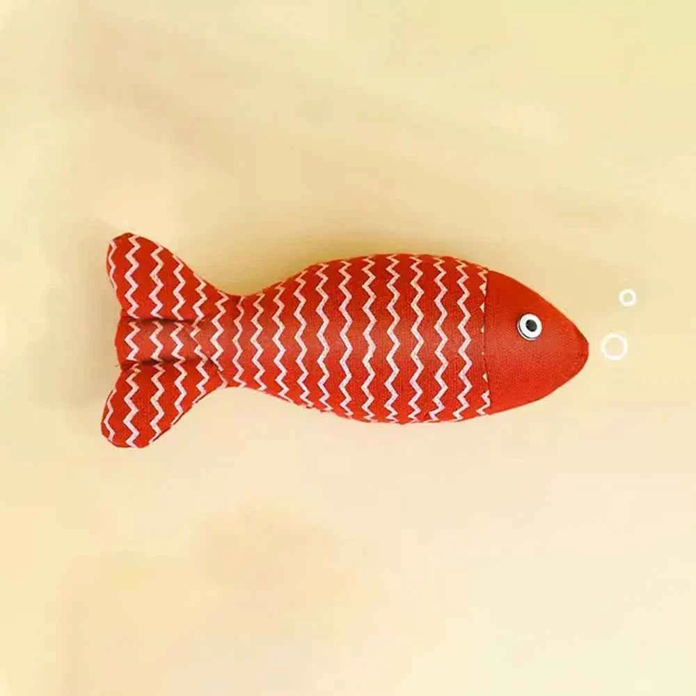 Red plush fish cat toy stuffed with catnip that flips and flops when batted