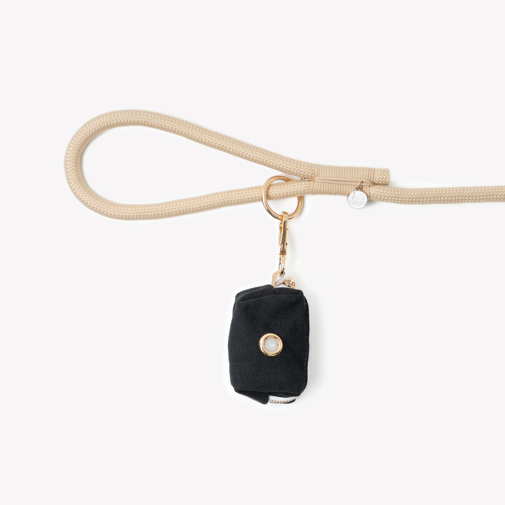 Black FURLOU poop bag holder, a cotton canvas pouch that holds one standard roll of bags