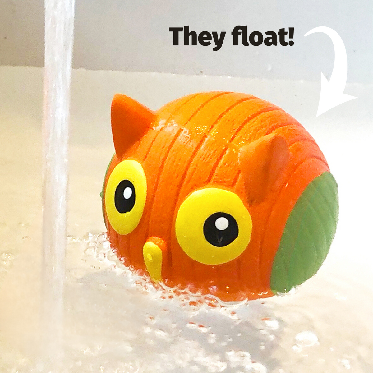 HuggleHounds Ruff-Tex float graphic: the pink Hamlet Pig latex ball floats for water fetch