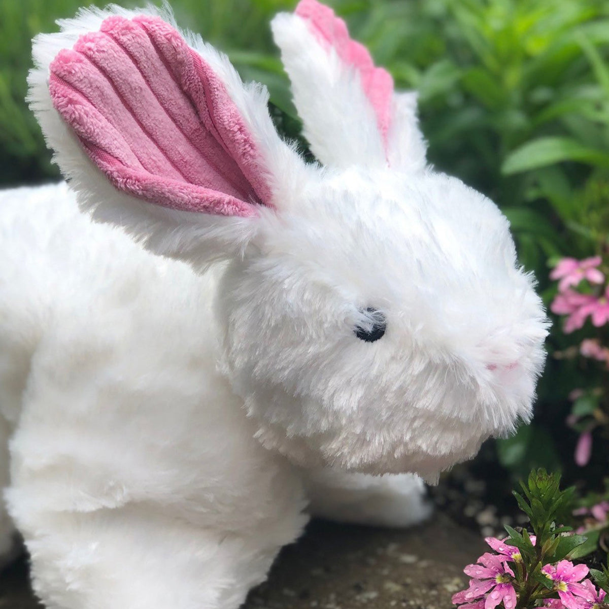 Soft white HuggleHounds Squooshie bunny dog toy with pink ears, made for carrying and cuddling