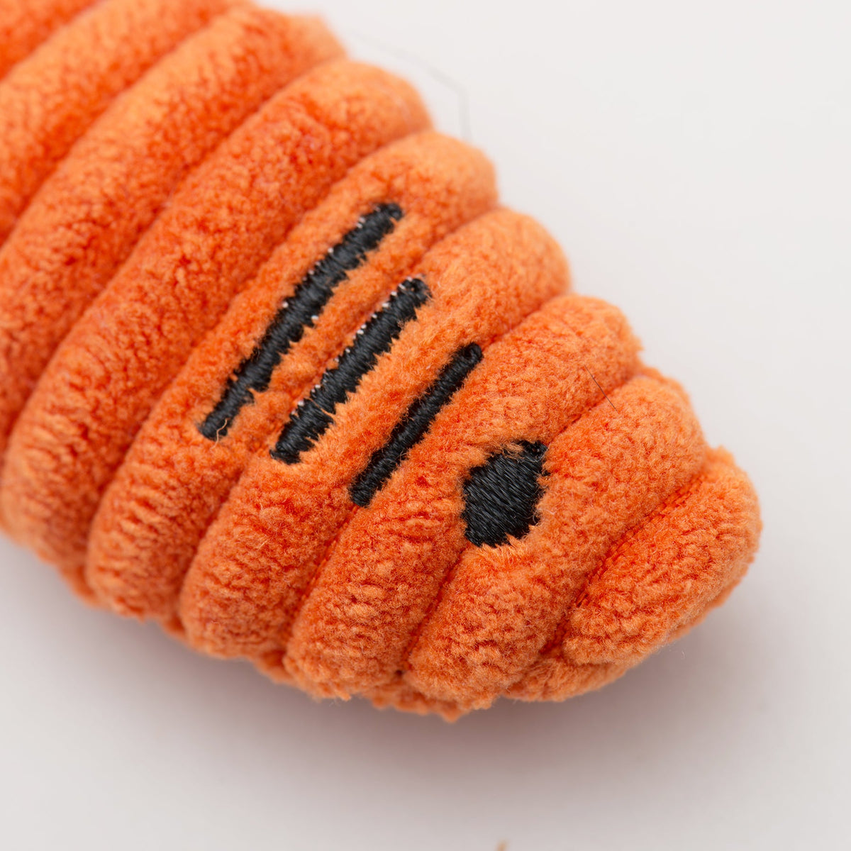 Embroidered gills and eye on a HuggleKats Sardinie corduroy catnip fish cat toy