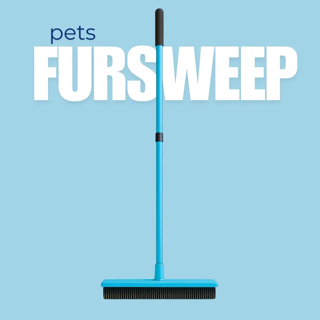 Reusable pet hair broom sweeping shed fur from the floor.