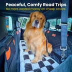 Dog resting on the hard-bottom car bed during travel