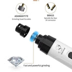 Ergonomic lightweight pet nail grinder held comfortably in hand.