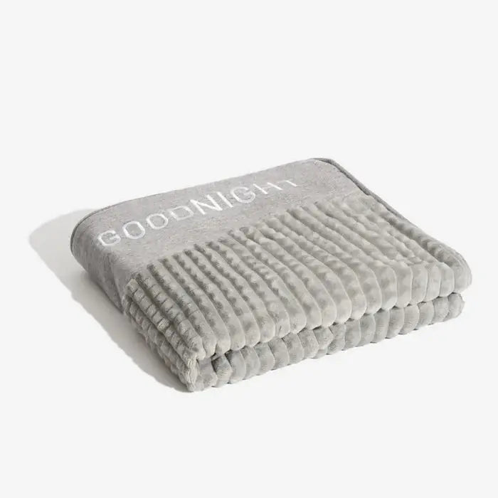 Calming cushioned dog bed in brown and grey