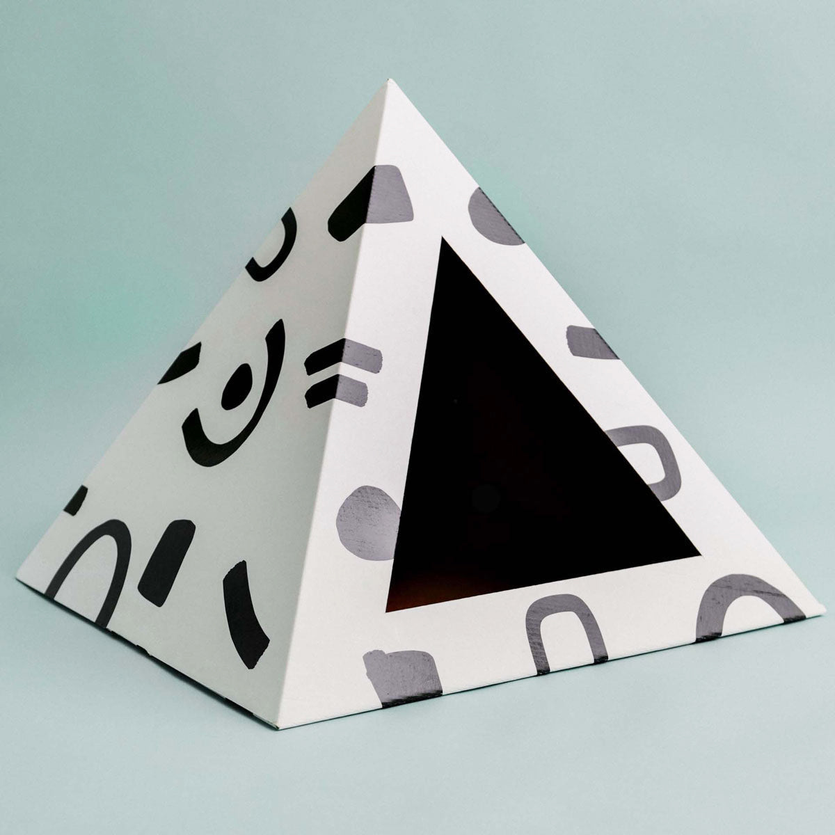 Kitty Kardboard Doodle cat house with a black-and-white doodle print, made from recycled cardboard