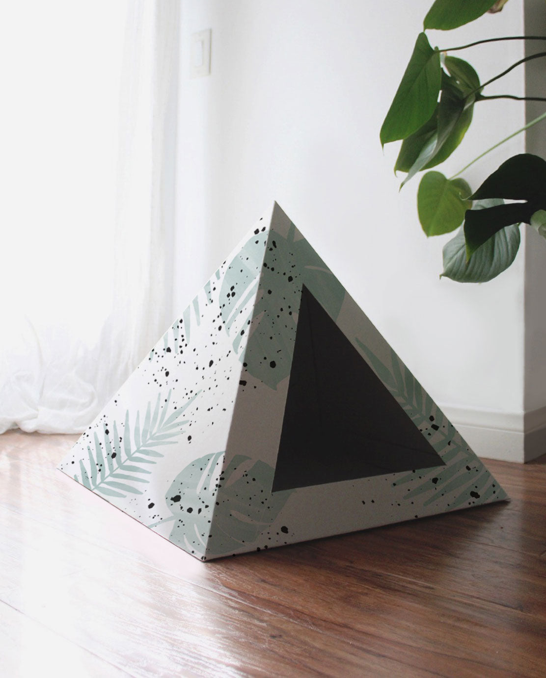 Oasis cat pyramid by Kitty Kardboard, a pyramid-shaped cardboard hideaway for indoor cats