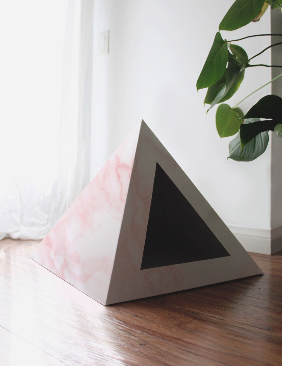 Rose Quartz Kitty Kardboard cat pyramid, a cozy cat hideaway that doubles as a decor piece for the room