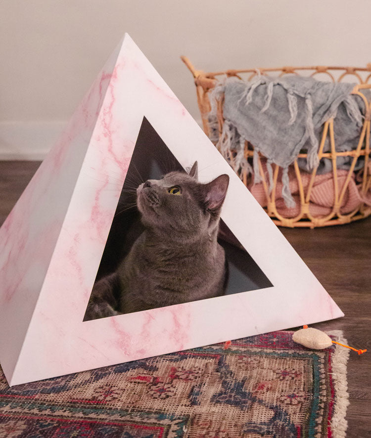 Rose Quartz cat pyramid by Kitty Kardboard, a pyramid-shaped cardboard hideaway for indoor cats