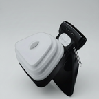 One-hand foldable poop scooper with a silicone basin that holds a waste bag