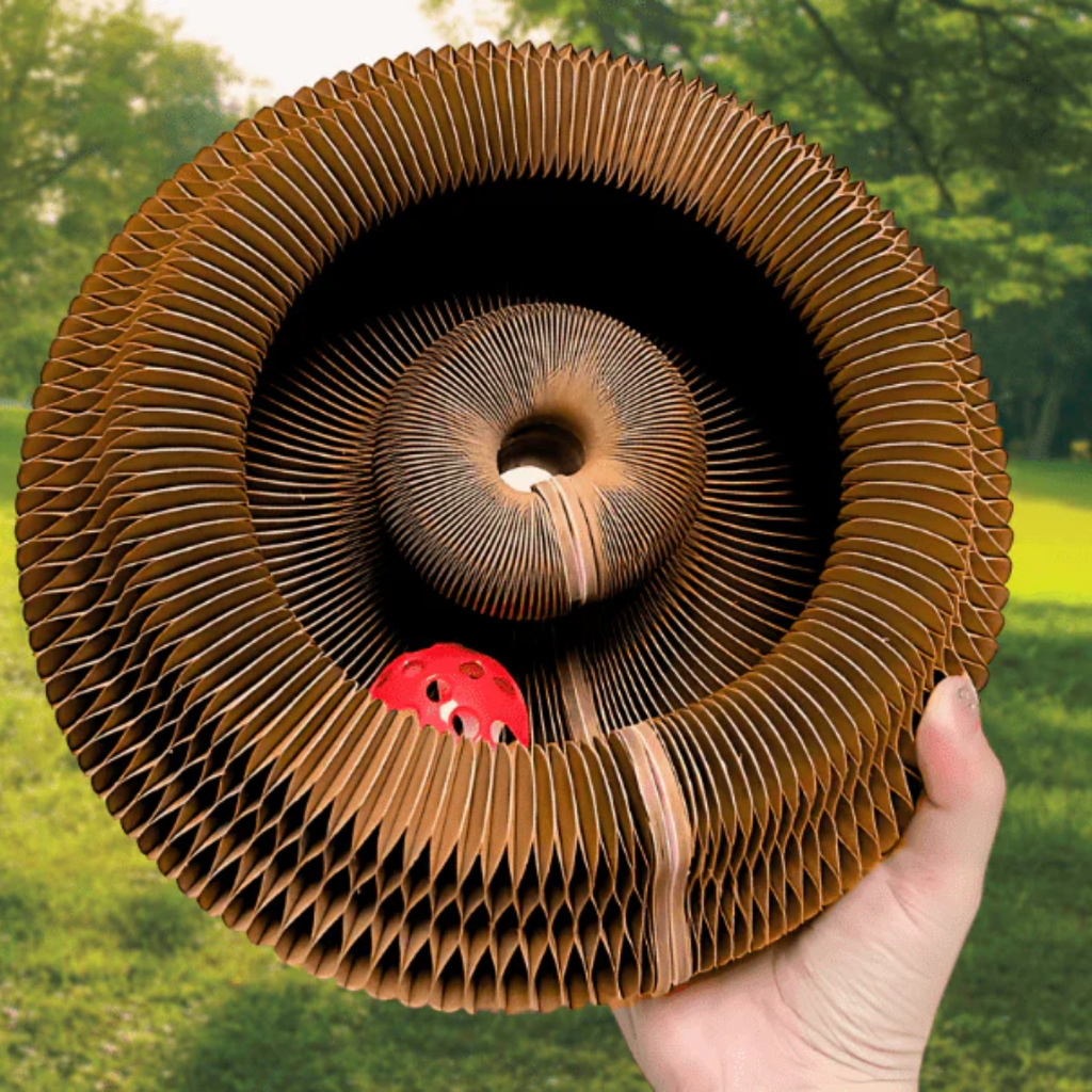 Pawsome Spinner accordion scratcher that doubles as a spot for cats to lounge and nap