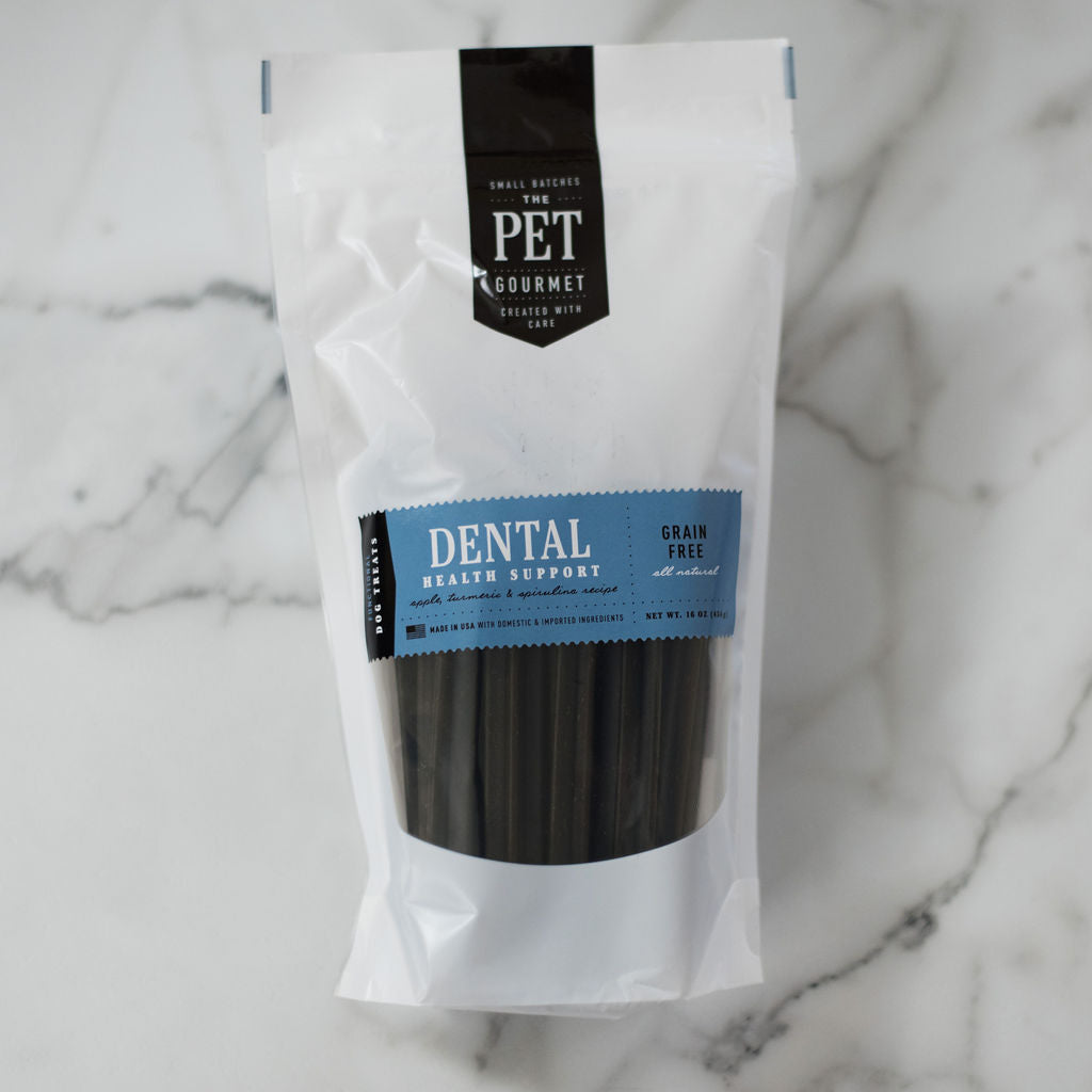Star-shaped grain-free dental chew sticks from The Pet Gourmet that reach between dog teeth