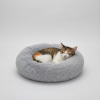 Plush donut pet bed with a removable cover for easier cleaning