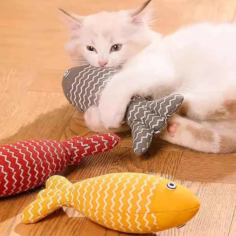 Plush fish toy with a small motor that makes it flop like a real fish for cats