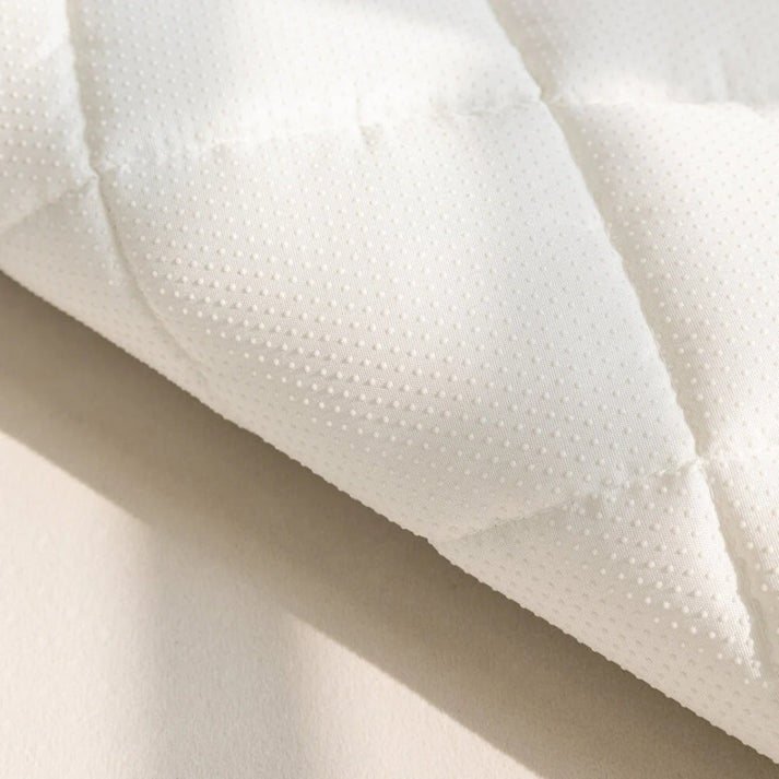 Plush furniture cover that protects sofas from pet hair