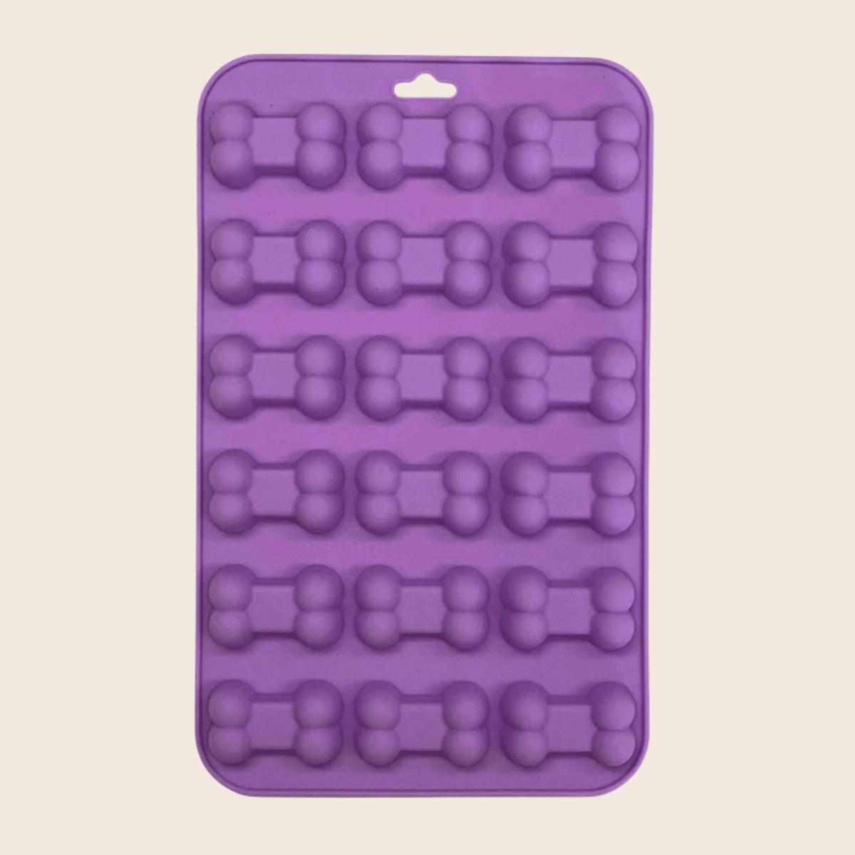 Purple Bones silicone treat mold by SodaPup with bone-shaped cavities for jelly dog treats