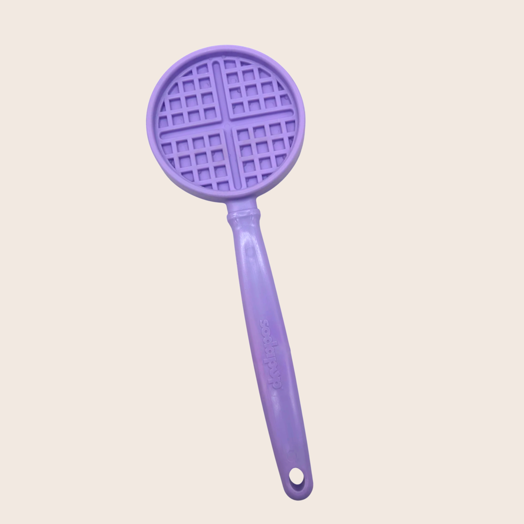 Close-up of the Purple Waffle lick stick by SodaPup, a waffle design in pastel purple