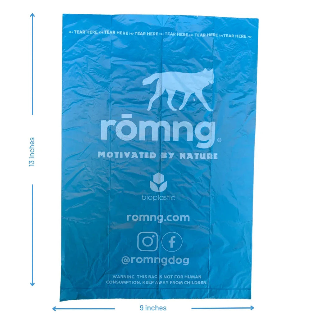 Single rōmng bio-based dog poop bag laid flat, 9 x 13 inches