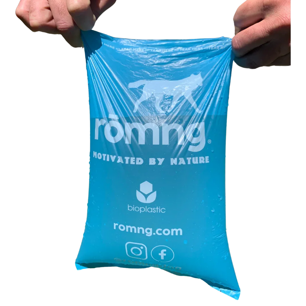 rōmng bio-based dog poop bag filled with water to show its leak-proof hold