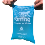 rōmng bio-based dog poop bag filled with water to show its leak-proof hold