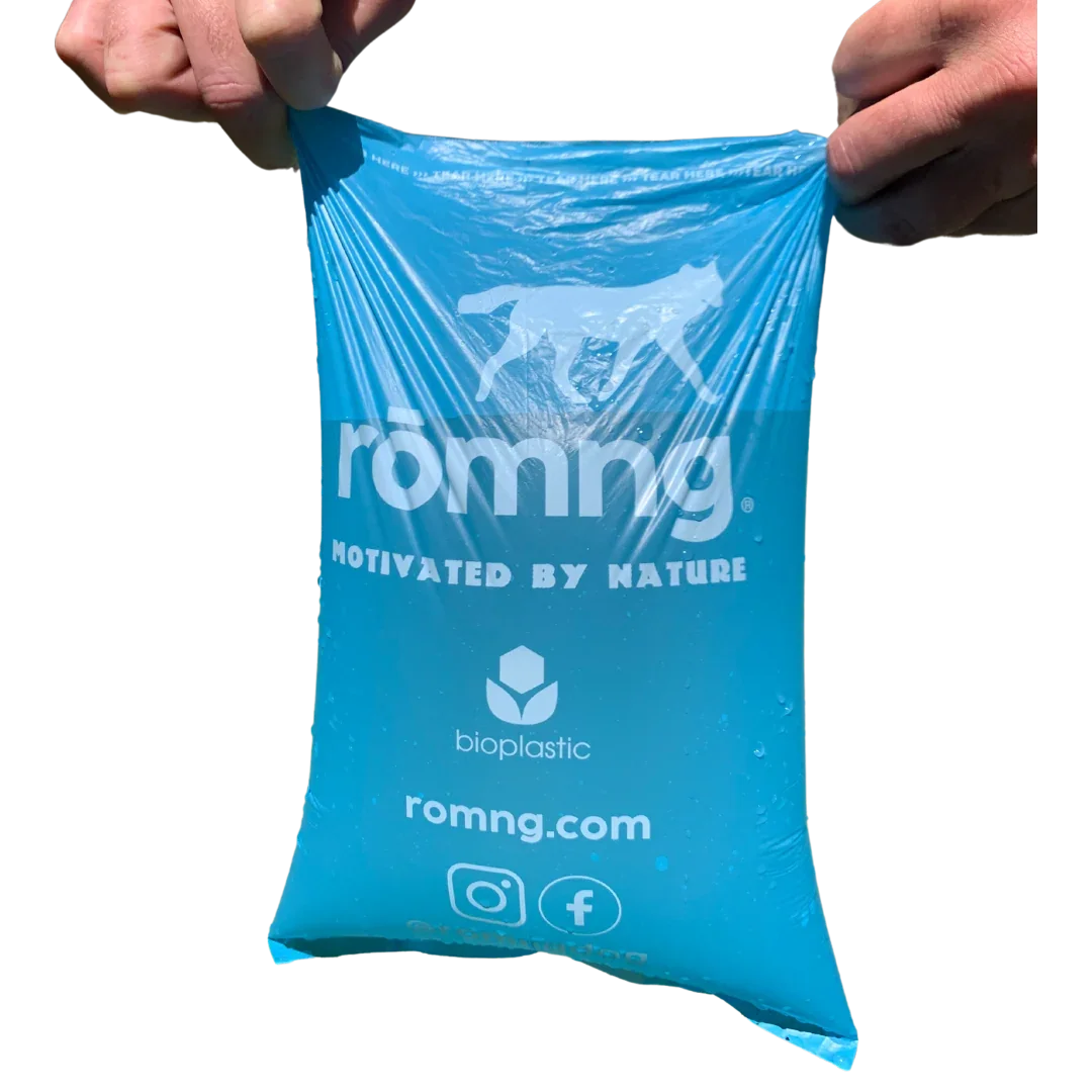 rōmng bio-based dog poop bag filled with water to show its leak-proof hold