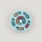 Blue Circle puzzle slow feeder toy for dogs and cats, a round plastic design