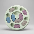 Round plastic puzzle feeder that helps slow down pets who eat too fast