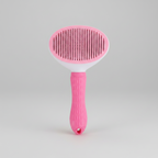 Pink self-cleaning slicker brush, TPR Fine Needle style, with a one-button pin release