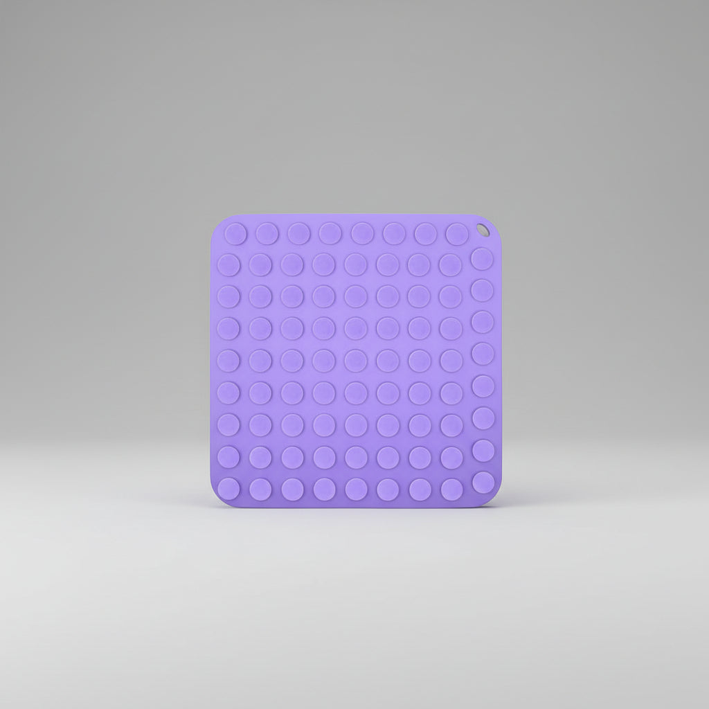 Silicone pet lick mat with suction cups that grip tile, glass and stainless steel
