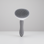 Grey TPR Fine Needle slicker brush that drops collected fur with one button press