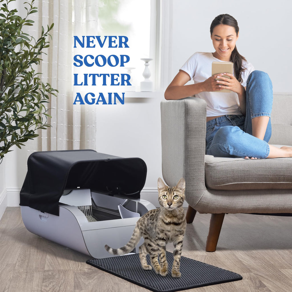 Wide-opening white smart litter box that lets cats of all sizes step in and out