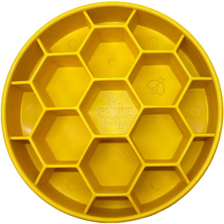 Yellow SodaPup Honeycomb eBowl, a 2-inch-deep slow feeder dog bowl with hexagon sections
