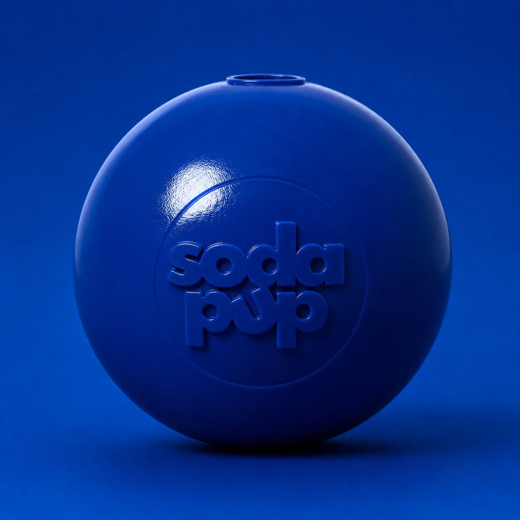 SodaPup Squeak Ball in blue, a Medium squeaky floating dog ball that fits most ball launchers