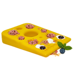 Yellow SodaPup Swiss Cheese Wedge, a cheese-shaped nylon chew toy made in the USA