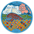 Overhead view of the blue SodaPup Whale eMat lick mat with its whale-themed relief pattern