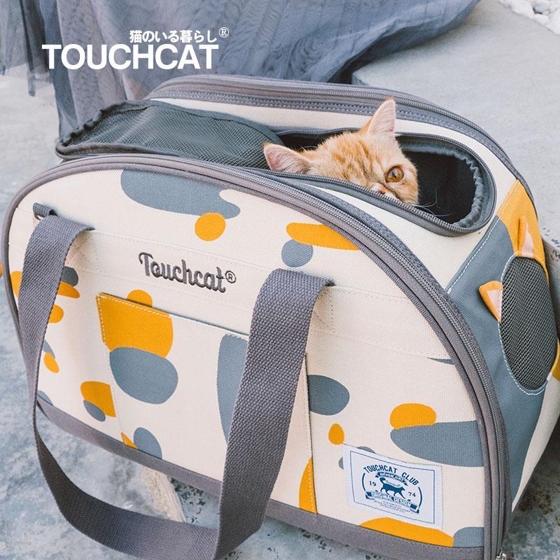 Touchcat Tote-Tails carrier with a removable inner cushion and an inside leash attachment