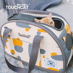 Touchcat Tote-Tails carrier with a removable inner cushion and an inside leash attachment