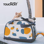 Touchcat Tote-Tails cat tote with an adjustable over-the-shoulder strap and hand straps